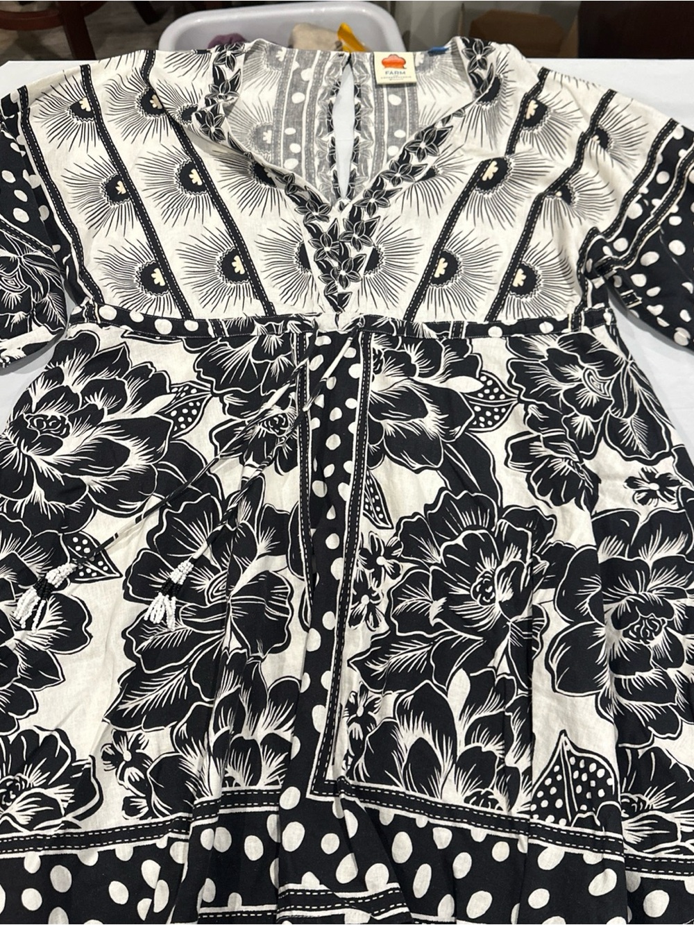 Anthropologie Black & White Floral Sunburst Tunic